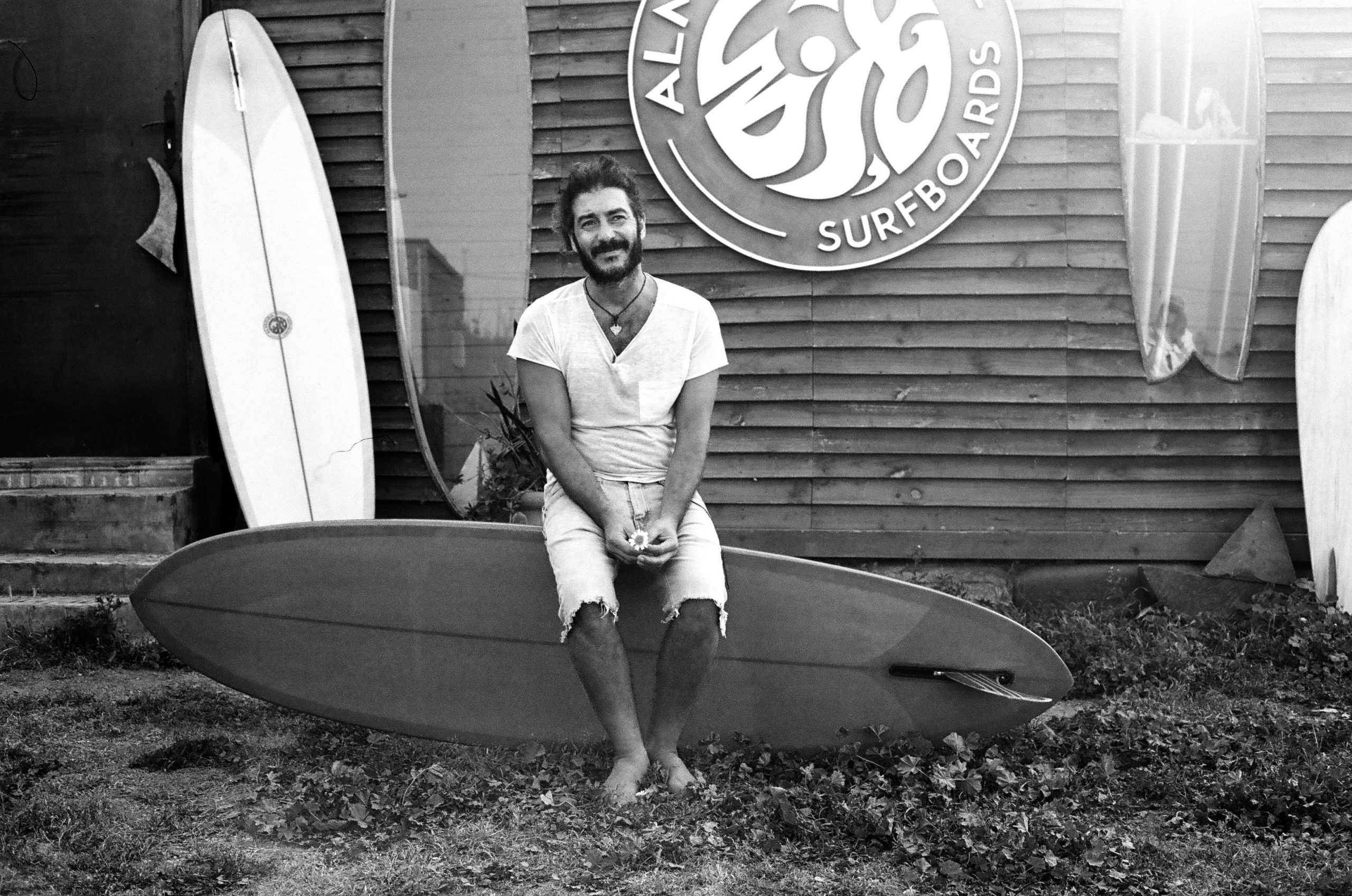 Youseff Almoda in front of Almoda Surfboards in Morocco 2023 //  Cori Stephens / Red Bull Content Pool // SI202310310174 // Usage for editorial use only //